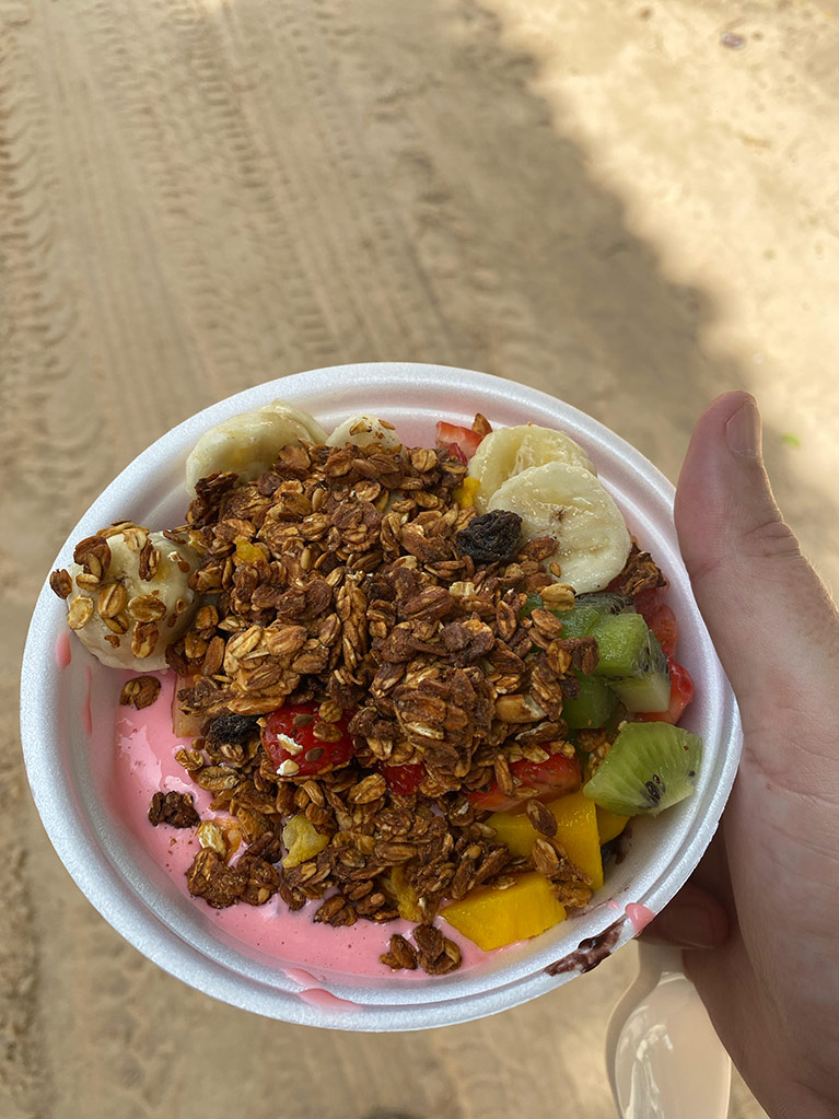 Açaí bowl — Amazonian palm fruit blended frozen, topped with granola and banana.